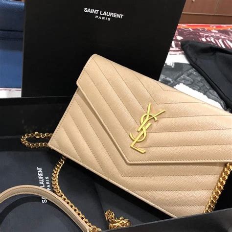 ysl small wallet on chain price|YSL wallet on chain used.